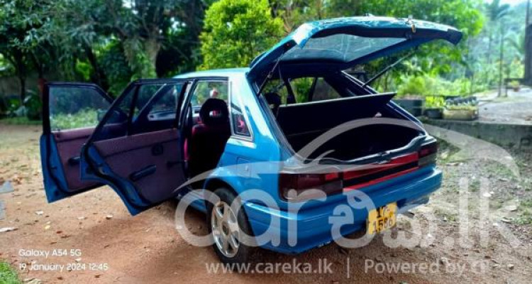MAZDA FAMILIA 323 1990